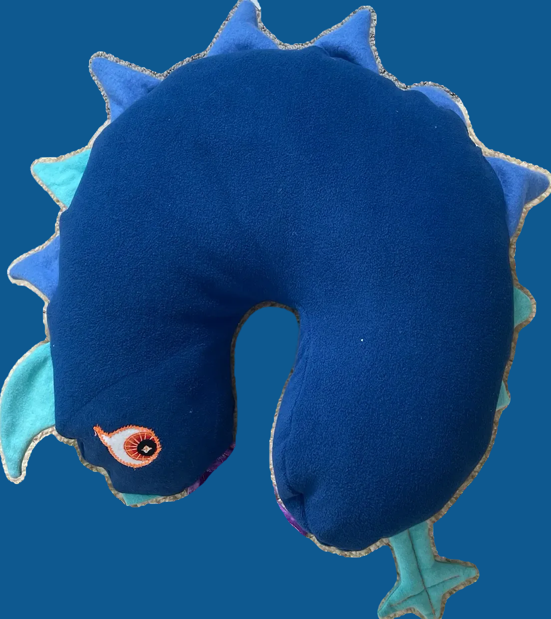 Custom stuffed animal made during a kids' sewing birthday party at Unfold Den in Denver
